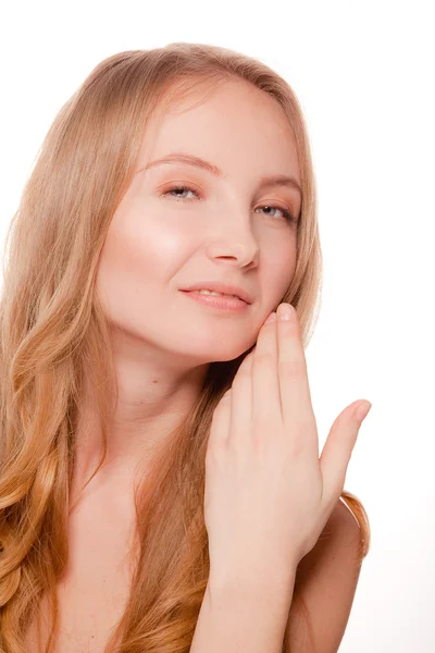 Beautiful woman touching her hair and face — Stock Photo, Image