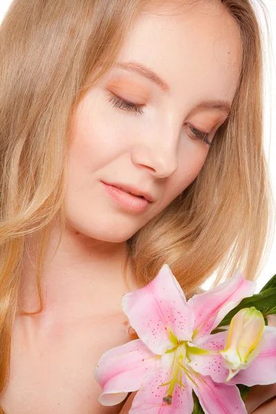 Beautiful girl with a flower lily — Stock Photo, Image