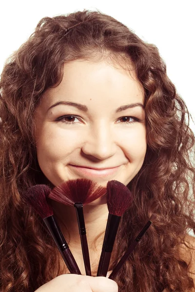 Young beautiful woman with make up tools — Stock Photo, Image