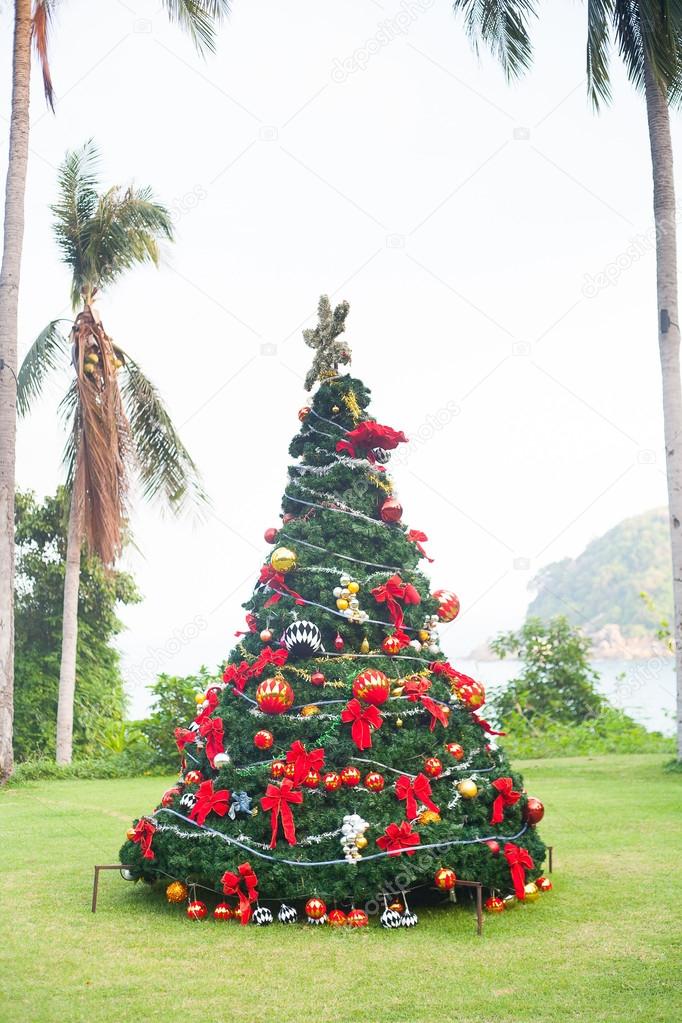 Christmas Tree On Beautiful Tropical Background