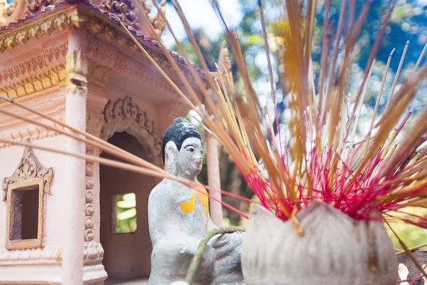 Offerings to gods in temple with aroma sticks — Stock Photo, Image