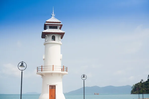 Lighthouse at the sea pier — Stock Photo, Image