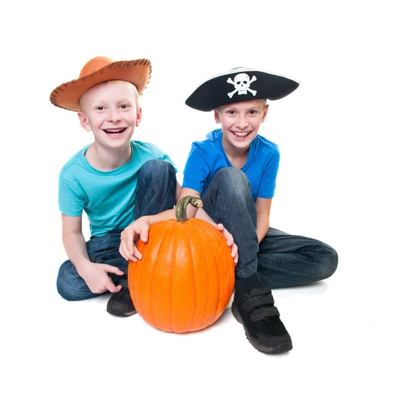 Pirate and cowboy with pumpkin - halloween theme — Stock Photo, Image