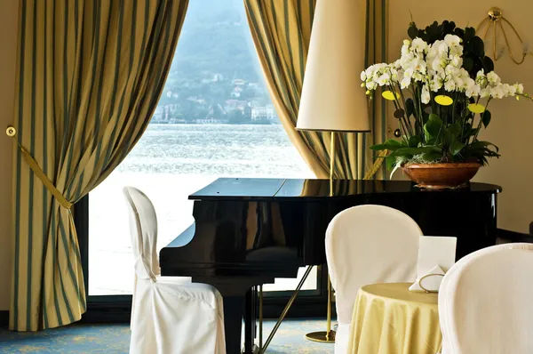 Hotel interior with piano — Stock Photo, Image