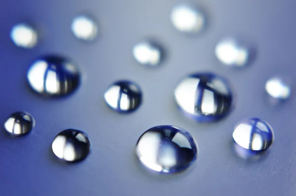 Gotas de agua en azul —  Fotos de Stock
