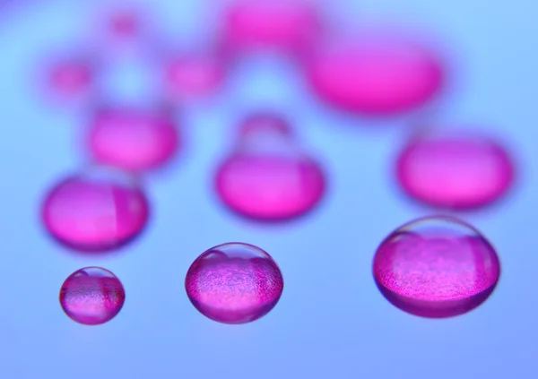 Gotas de agua púrpura futurista —  Fotos de Stock