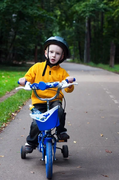 Boy riding bicycle — Stock Photo, Image