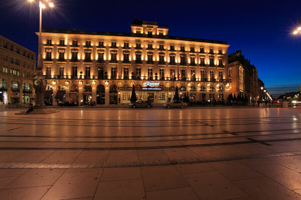 Night view of Regent hotel on the square of Grand Theater of Bordeaux, Aquitaine, France.