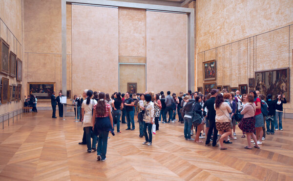 Interior and vistors of Louvre museum, Paris, France