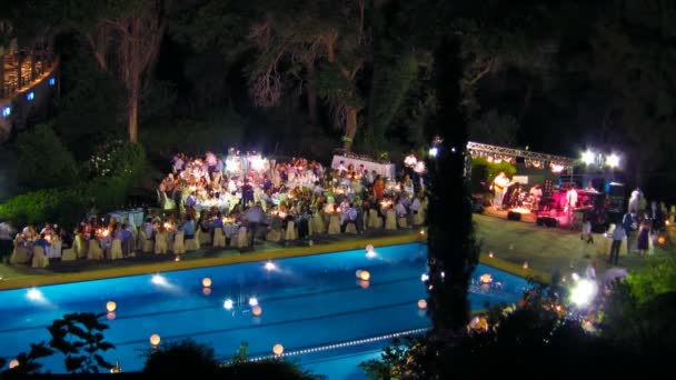 Time-lapse: wedding near pool at night, Corfu, Greece — Stock Video