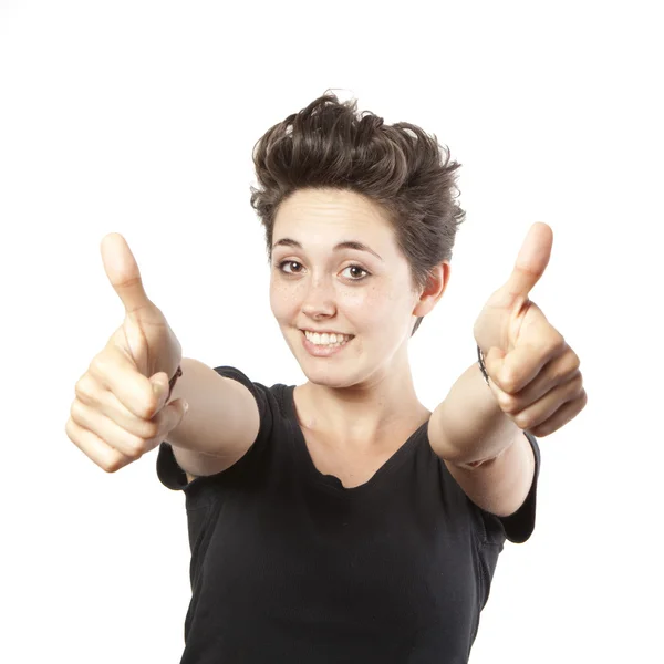 Joyeux sourire fille avec les pouces vers le haut geste, isolé sur fond blanc — Photo