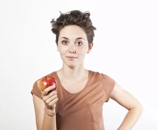 Porträtt av vacker flicka med ett äpple — Stockfoto