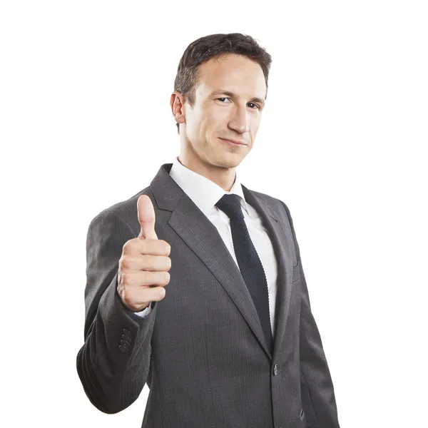 Smiling businessman with thumb up — Stock Photo, Image