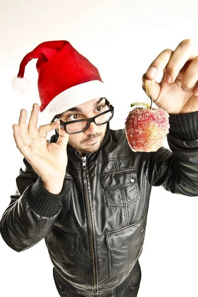 Young guy with christmas ball — Stock Photo, Image