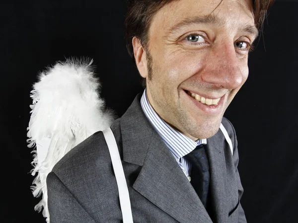 Uomo d'affari con ali d'angelo — Foto Stock