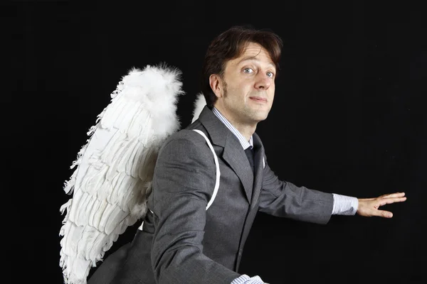 Empresário com asas de anjo — Fotografia de Stock