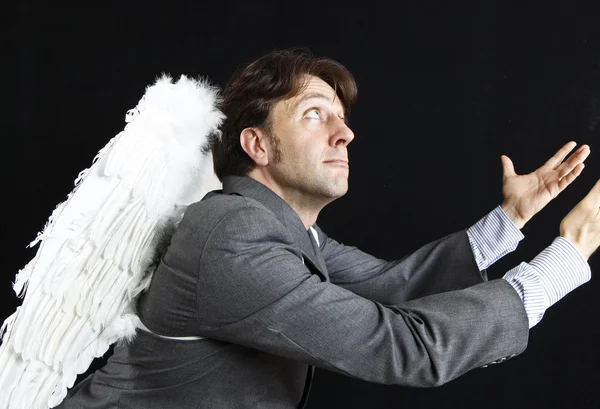 Businessman with angel wings — Stock Photo, Image