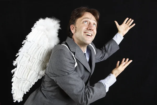 Бізнесмен з крилами ангела — стокове фото