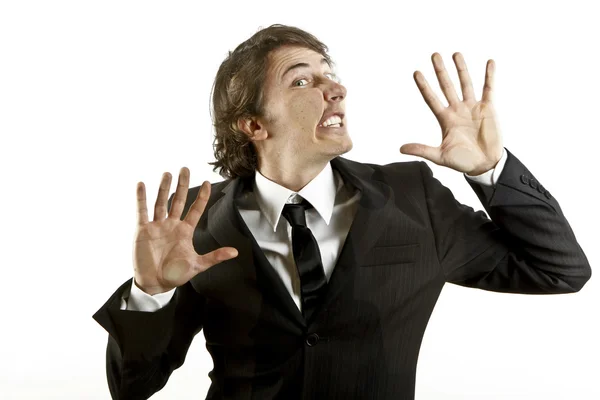 Young businessman crushed on a glass — Stock Photo, Image