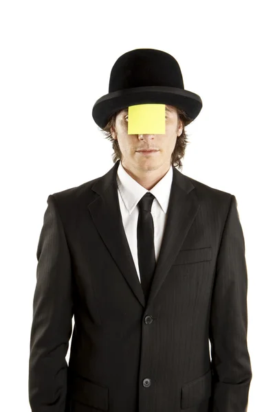 Man with blank note on the face with hat — Stock Photo, Image