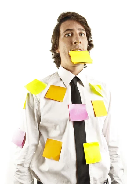 Young man covered by notes — Stock Photo, Image