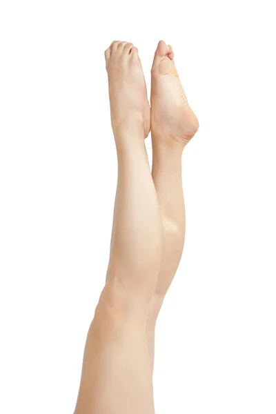 Piękna kobieta nogi izolowane na białym — Zdjęcie stockowe