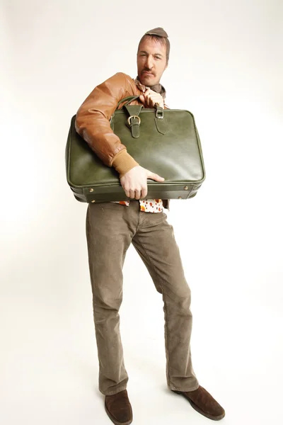 Грабитель банка с винтажным чемоданом — стоковое фото