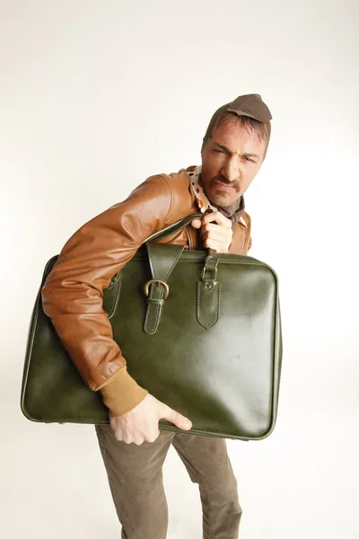 Грабитель банка с винтажным чемоданом — стоковое фото