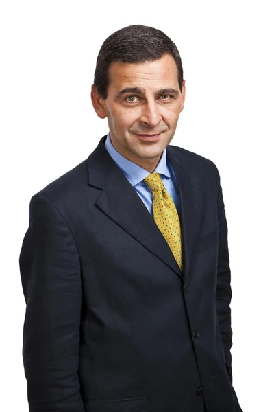 Porträt eines selbstbewussten Geschäftsmannes vor weißem Hintergrund — Stockfoto