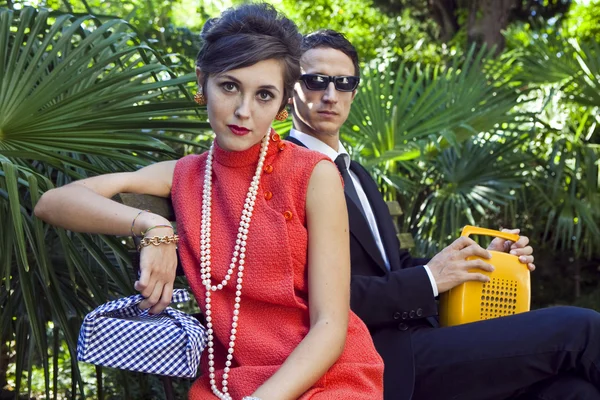 Fashion portrait of retro sixties style young couple — Stock Photo, Image