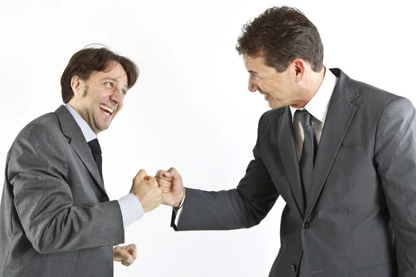 Two businessmen handshake isolated on white Stock Image