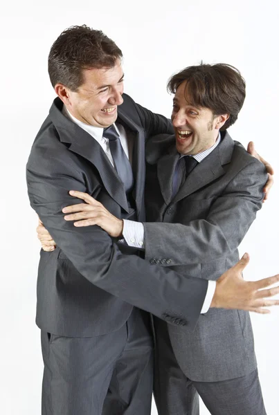 Two businessmen happy seeing each other isolated on white Royalty Free Stock Photos