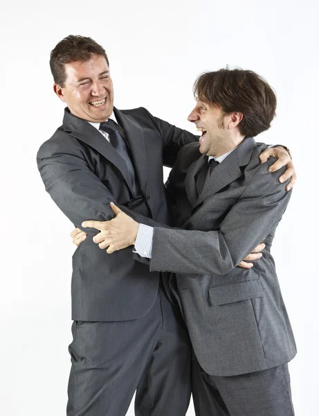 Two businessmen happy seeing each other isolated on white Stock Photo