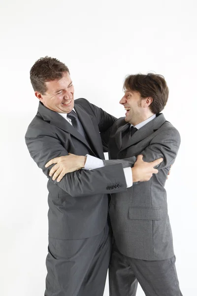 Two businessmen happy seeing each other isolated on white Royalty Free Stock Images