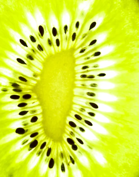 Kiwi fruta rebanada retroiluminado —  Fotos de Stock