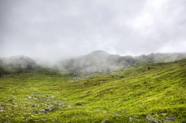 Cloudy mountain valley — Stock Photo, Image