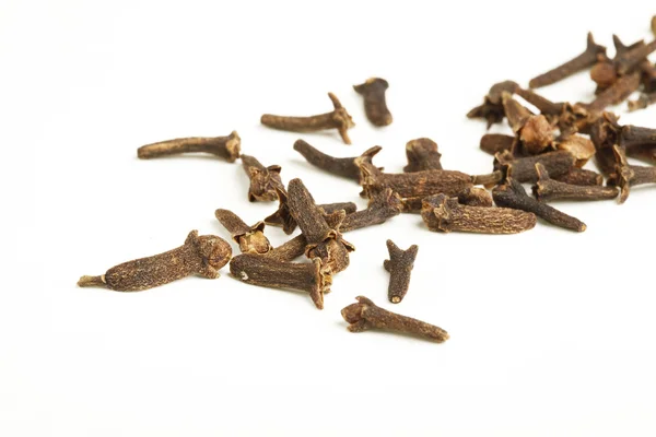 Close-up of cloves on white background — Stock Photo, Image