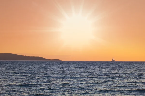 Sailing boat in the sunset — Stock Photo, Image