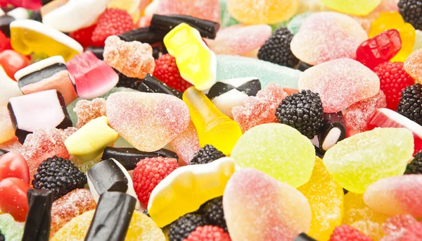 다채 로운 설탕 사탕의 뒤섞인 배경 — 스톡 사진