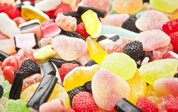 Gemischte bunte Zuckerbonbons Hintergrund — Stockfoto