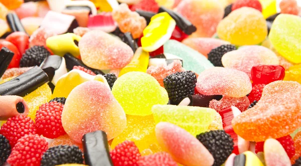 Blandede farverige sukker slik baggrund - Stock-foto