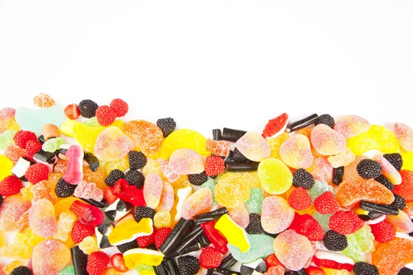 Смешанные красочные конфеты фон — стоковое фото