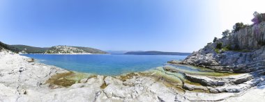 panoramic view of a beautiful rocky beach in croatia, blue sea clipart