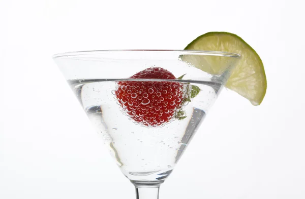Strawberry floating in a cocktail — Stock Photo, Image