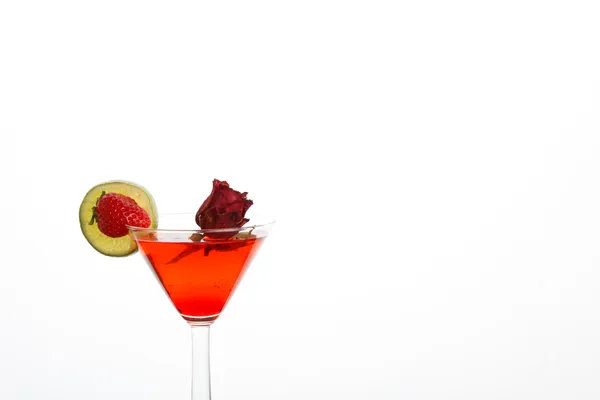 Rose floating in a red liquor with strawberry — Stock Photo, Image