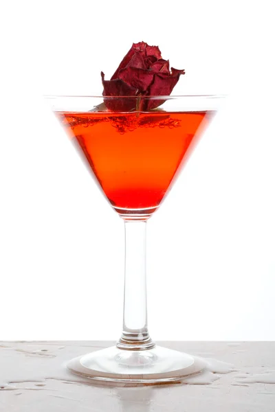 Rose floating in a red liquor — Stock Photo, Image