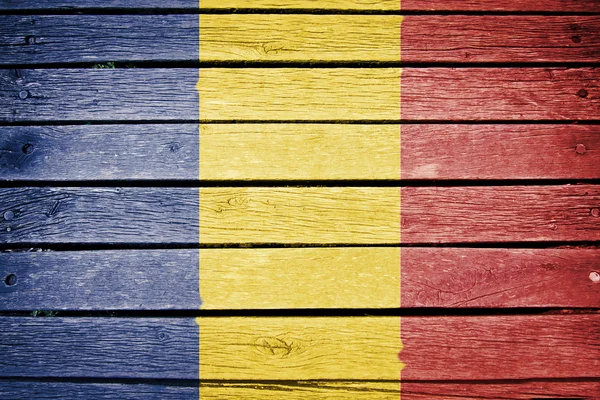 Romênia, bandeira romena pintada no fundo da prancha de madeira velha — Fotografia de Stock