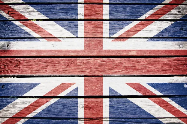 Vereinigtes Königreich Flagge auf alten Holzplanken Hintergrund gemalt — Stockfoto