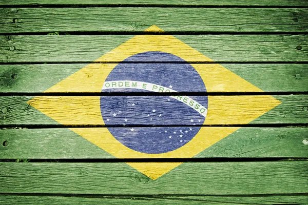 Brazílie, brazilské vlajky na staré dřevěné prkenné pozadí — Stock fotografie