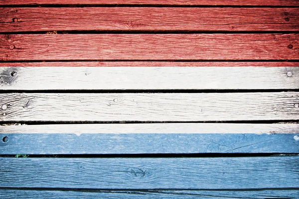 Luxemburgués, luxemburgués, bandera pintada sobre tabla de madera vieja backgr — Foto de Stock